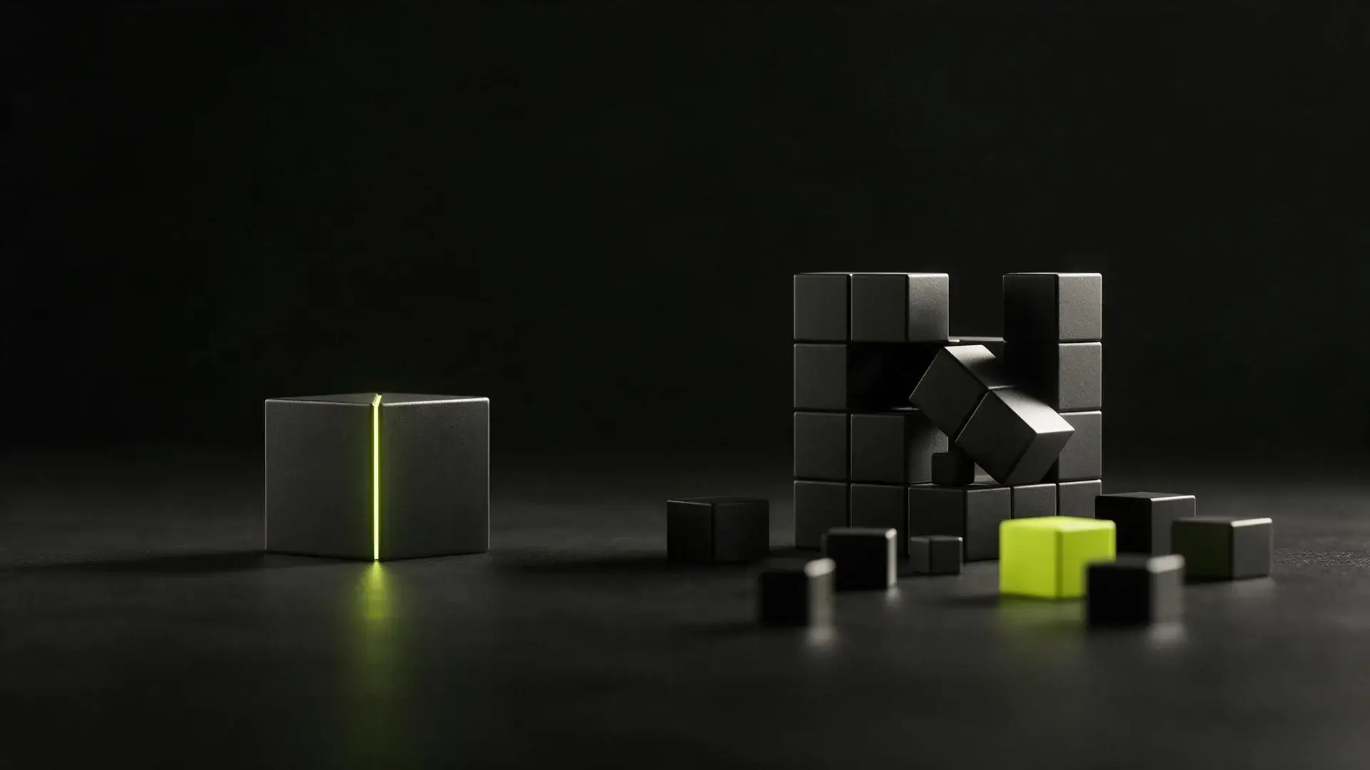 A sealed dark block with a lime seam beside a half-assembled set of loose modular blocks.