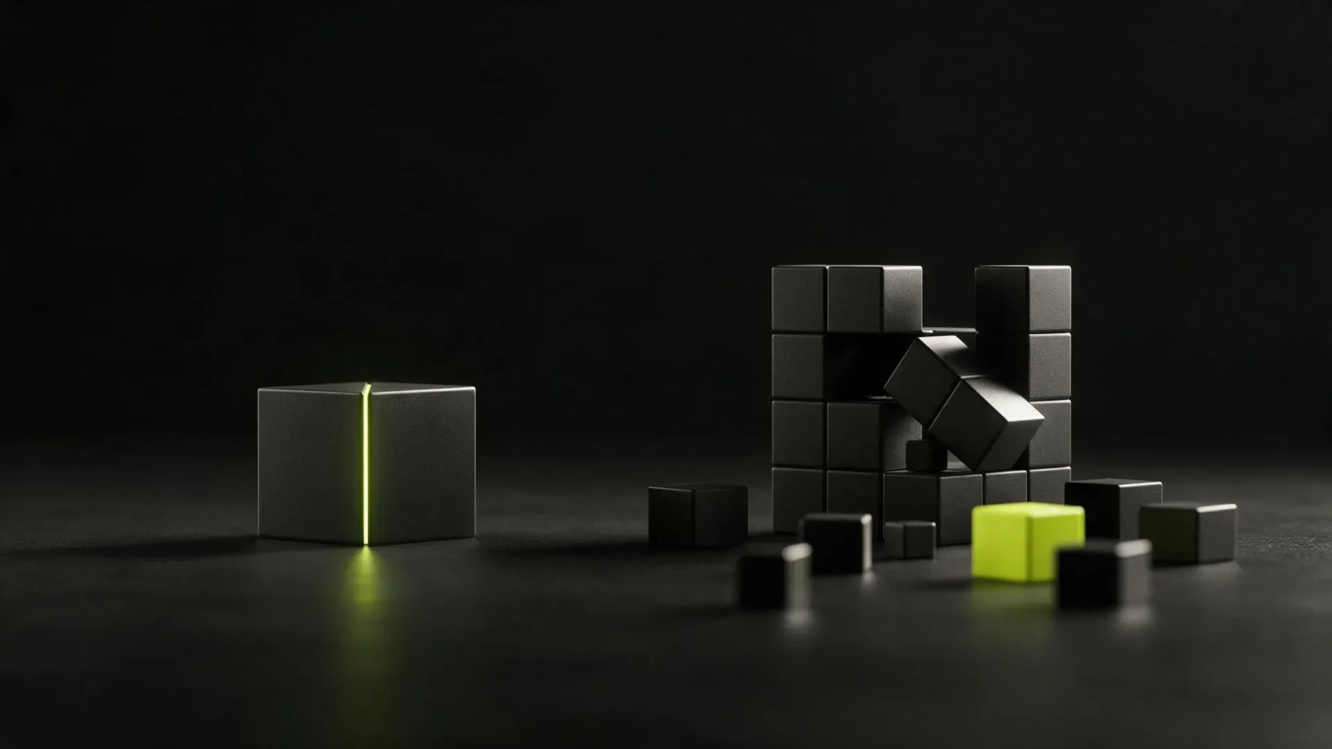 A sealed dark block with a lime seam beside a half-assembled set of loose modular blocks.